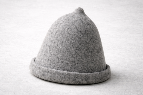 Lautva grey wool felt sauna hat on birch wood surface